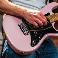 Close up view of guitarist playing the Cort G290 Modern Electric Guitar Dusty Rose