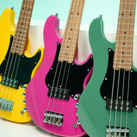 Side-by-side close up front view of Cort GB-Short Scale 4-String Electric Bass Guitar Yellow Crush, Forest Green, and Fandango Purple on white surface with blue background