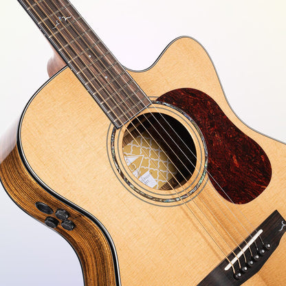 Angled close up view of Cort Gold-OC6 Acoustic Electric Guitar on purple background