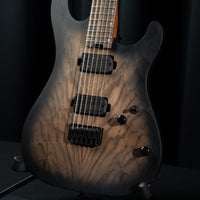 Close up angled view of Cort KX500 Baritone Electric Guitar in studio