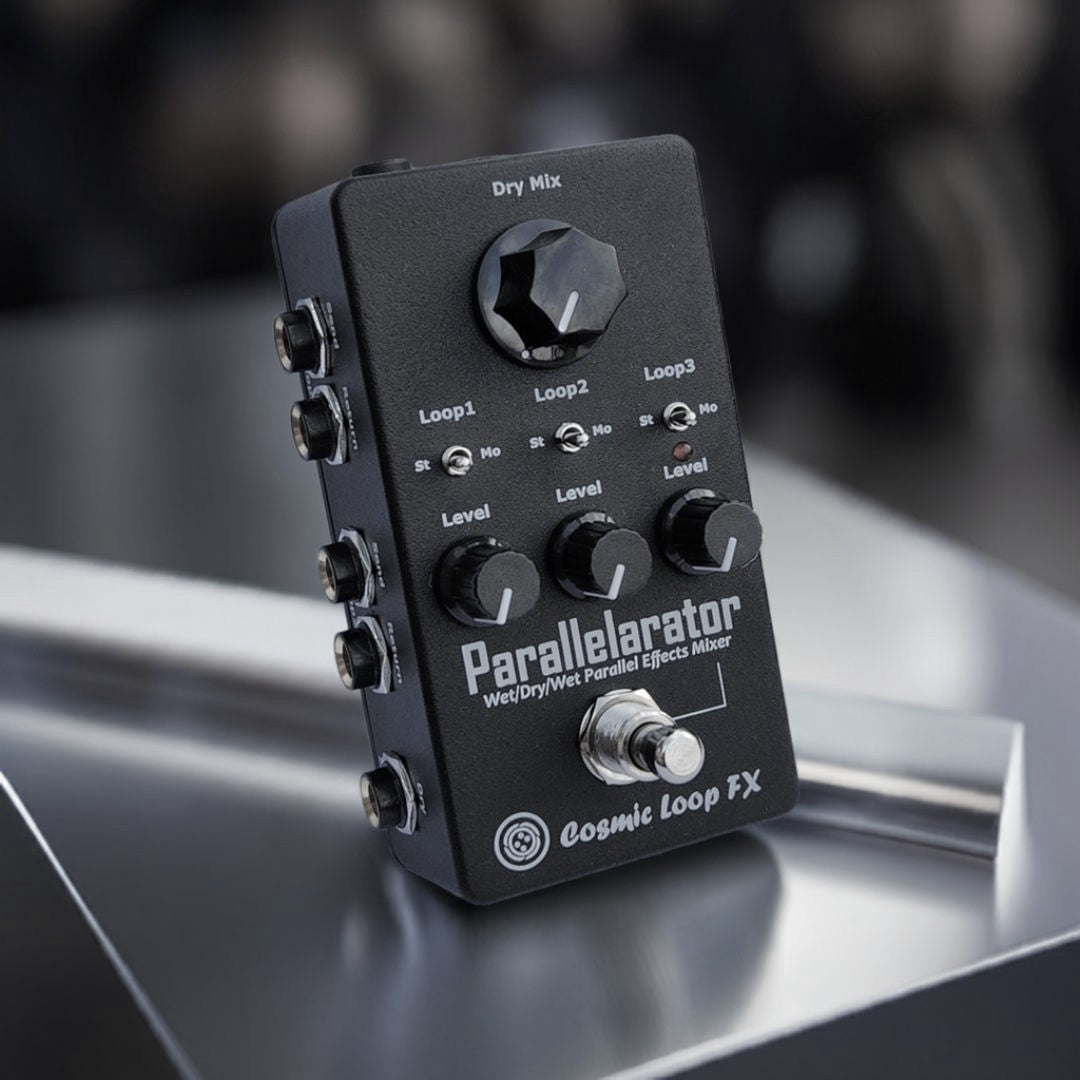 Angled front view of Cosmic Loop FX Parallelarator Pedal on metallic surface in studio