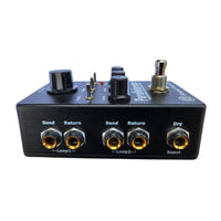 Audio effects pedal with multiple connectors on a white background