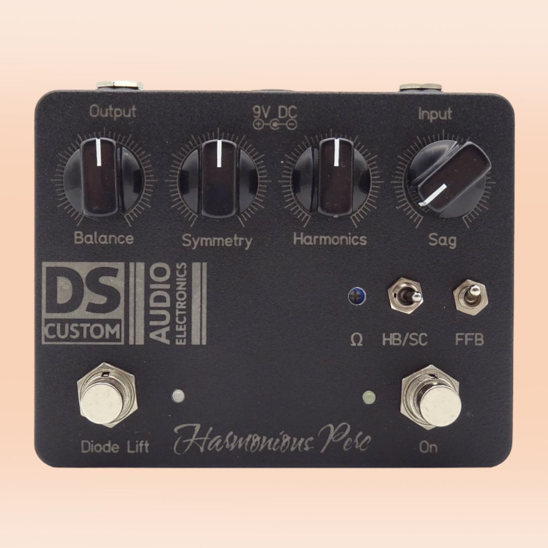 Front view of DS Custom Harmonious Perc Pedal on orange background