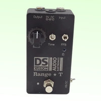 Front view of DS Custom Range T Pedal on green background