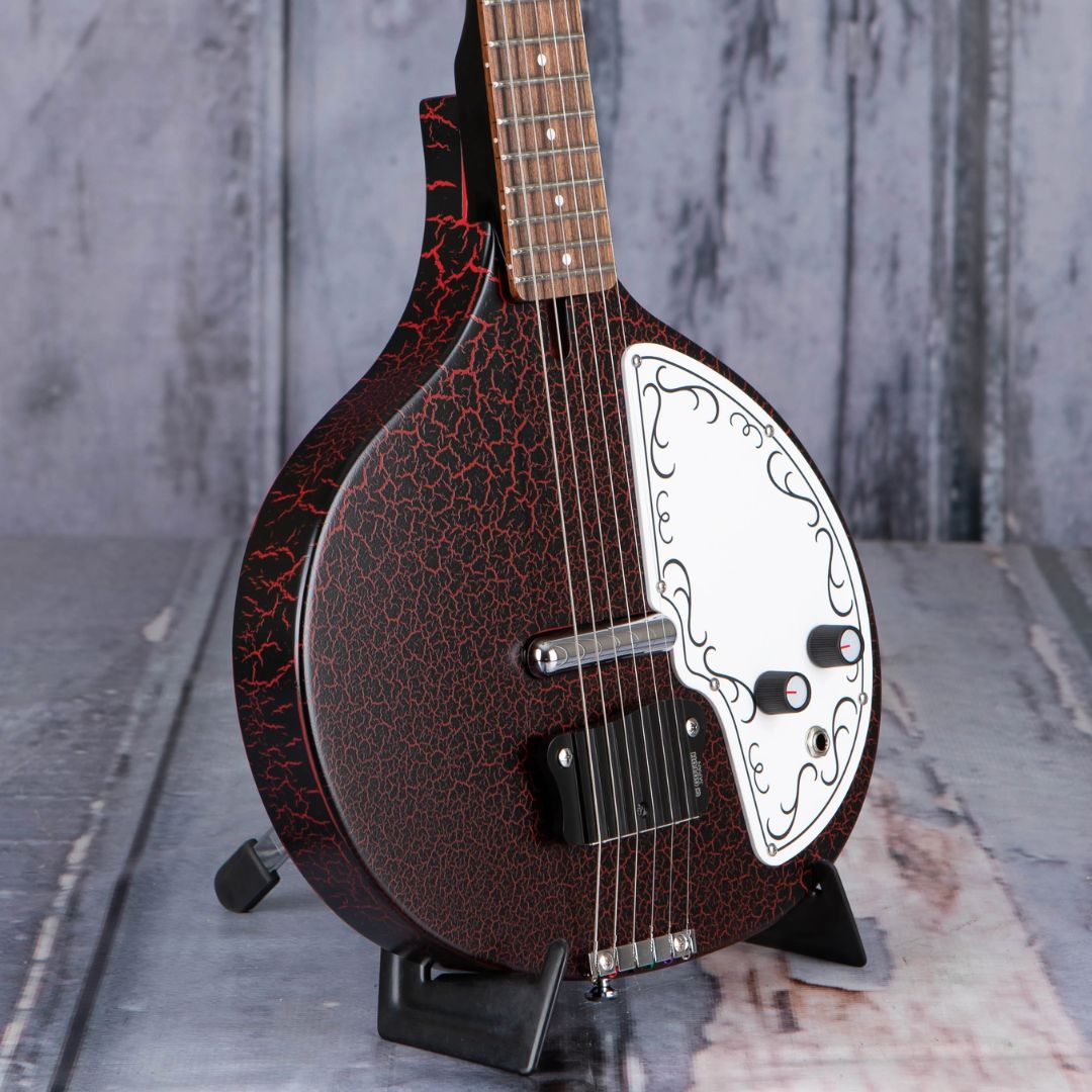 Angled close up view of Danelectro Baby Sitar Electric Guitar Red Crackle with gray background