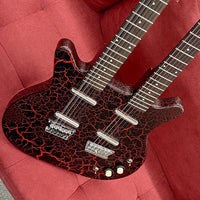 Close up front view of Danelectro Doubleneck Electric Guitar Red Crackle on red couch