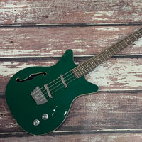 Angled view of Danelectro Fifty Niner Long Scale Bass Guitar (Jade) on wooden surface