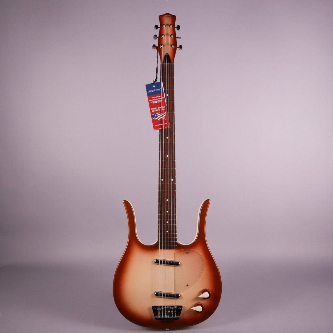 Front view of Danelectro Longhorn Baritone Electric Guitar Copper Burst on gray background