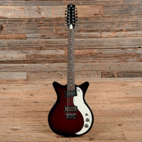 Front view of Danelectro '59X12 Electric Guitar Red Burst with wooden background