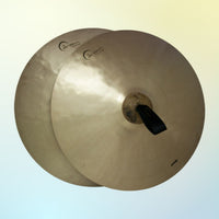 Front view of Dream Cymbals A2E21 Energy Series 21" Hand Cymbals (Pair) on yellow and blue gradient background