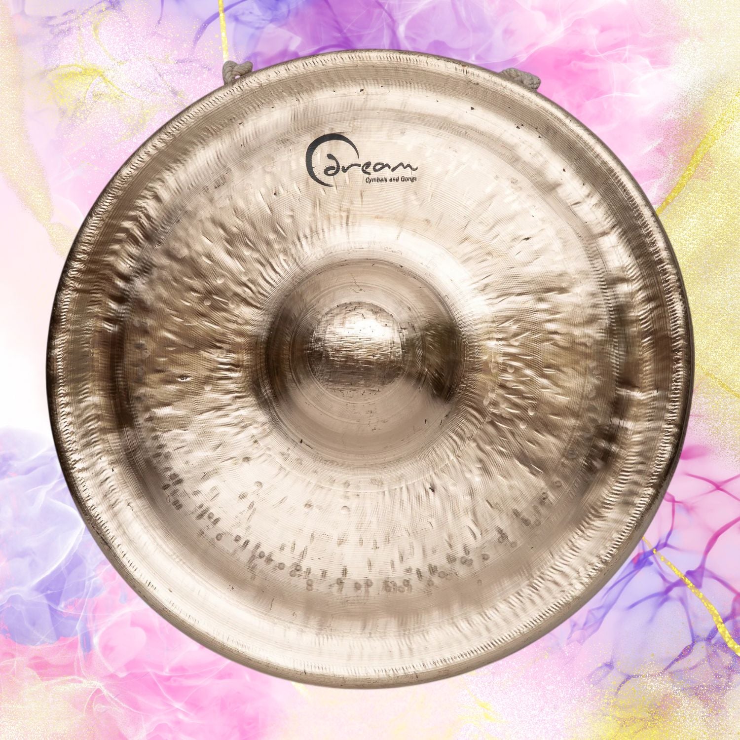 Front view of Dream Cymbals Tuned Mbao Nipple Gong on multicolored background
