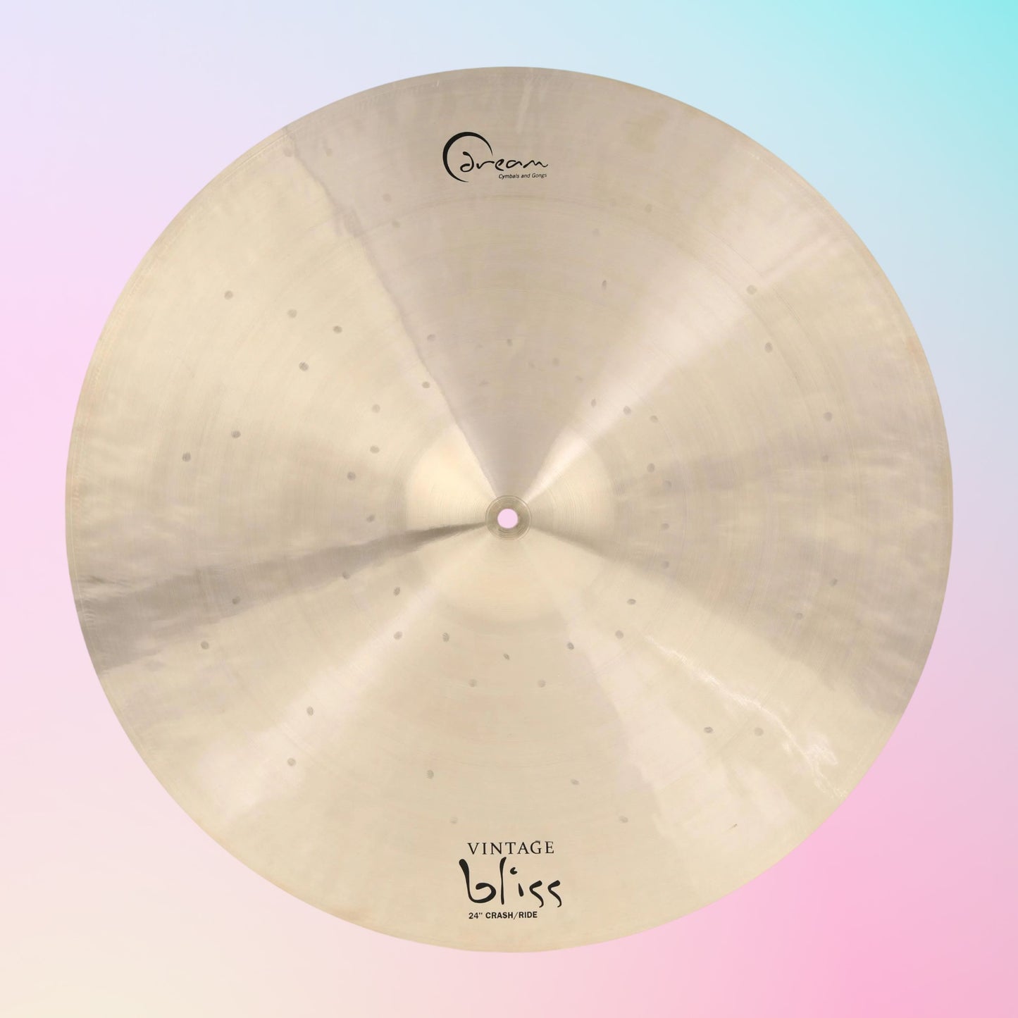 Front view of Dream Cymbals VBCRRI24 Vintage Bliss 24" Crash/Ride Cymbal on pink and blue gradient background