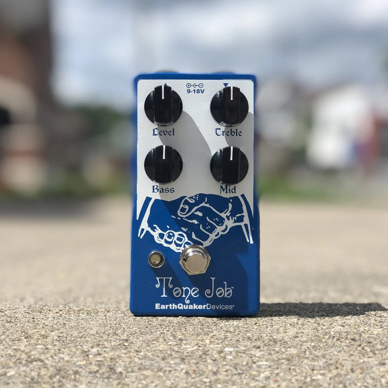 EarthQuaker Devices Tone Job Pedal On a Concrete Surface