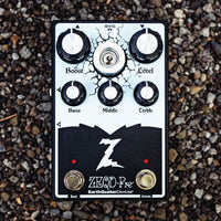 Front view of EarthQuaker Devices ZEQD-Pre Pedal on pebbles