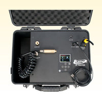 Top view of Elation Lighting IP TESTER Mobile IP Vacuum and Pressure Tester with cables attached on yellow background