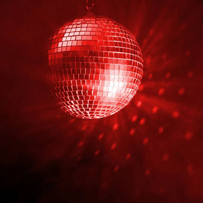 Front view of Eliminator Lighting M502EL 12" Mirror Ball with red lighting in dark venue