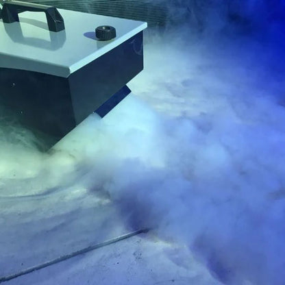 Eliminator Lighting Mister Kool EP Fog Machine releasing fog in dark venue