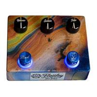 Top view of Flattley Bass Solaris Bass Fuzz with Boost Pedal on white background