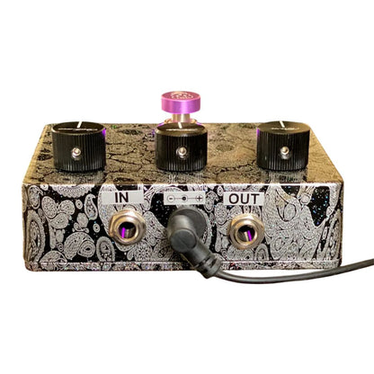 Rear view of Flattley Centurion Transparent Overdrive Pedal with power cable on white background