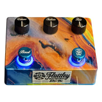 Angled top view of Flattley Solaris Pro Fuzz with Boost Pedal on white background