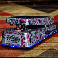 Angled front view of Flattley Sugar Skulls The Flattley Bass Wah Pedal with Union Jack background