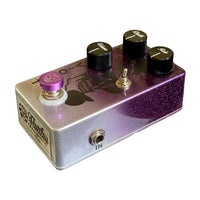 Angled side view of Flattley Violet Tremolo Pedal on white background