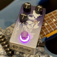 Angled top view of Flattley Violet Tremolo Pedal on top of guitar