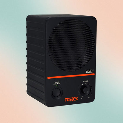 Angled view of Fostex 6301ND 4" Active Speaker on green and orange background