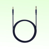 Coiled view of Fostex ET-RP4.4BL 4.4mm 5-Pole Balanced Cable on green background
