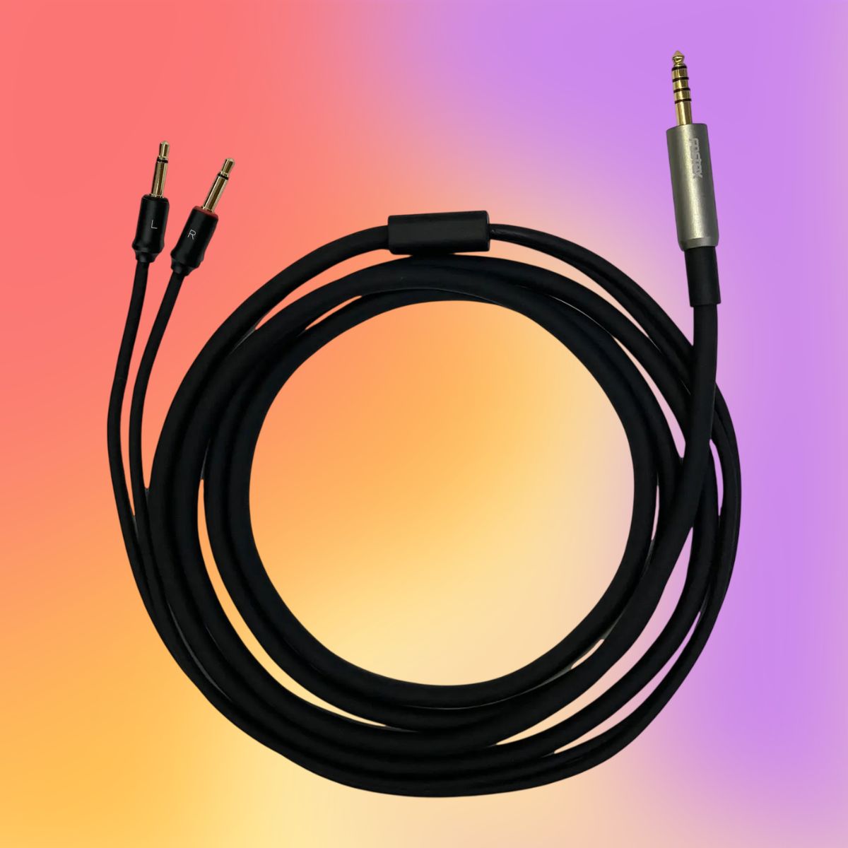 Coiled Fostex ET-TH4.4BL2Y 4.4mm 5-Pole Balanced Cable on multicolored background