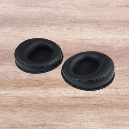 Angled front view of Fostex EX-EP-61 Replacement Ear Pads for TH610/TH616 (Pair) on wooden surface