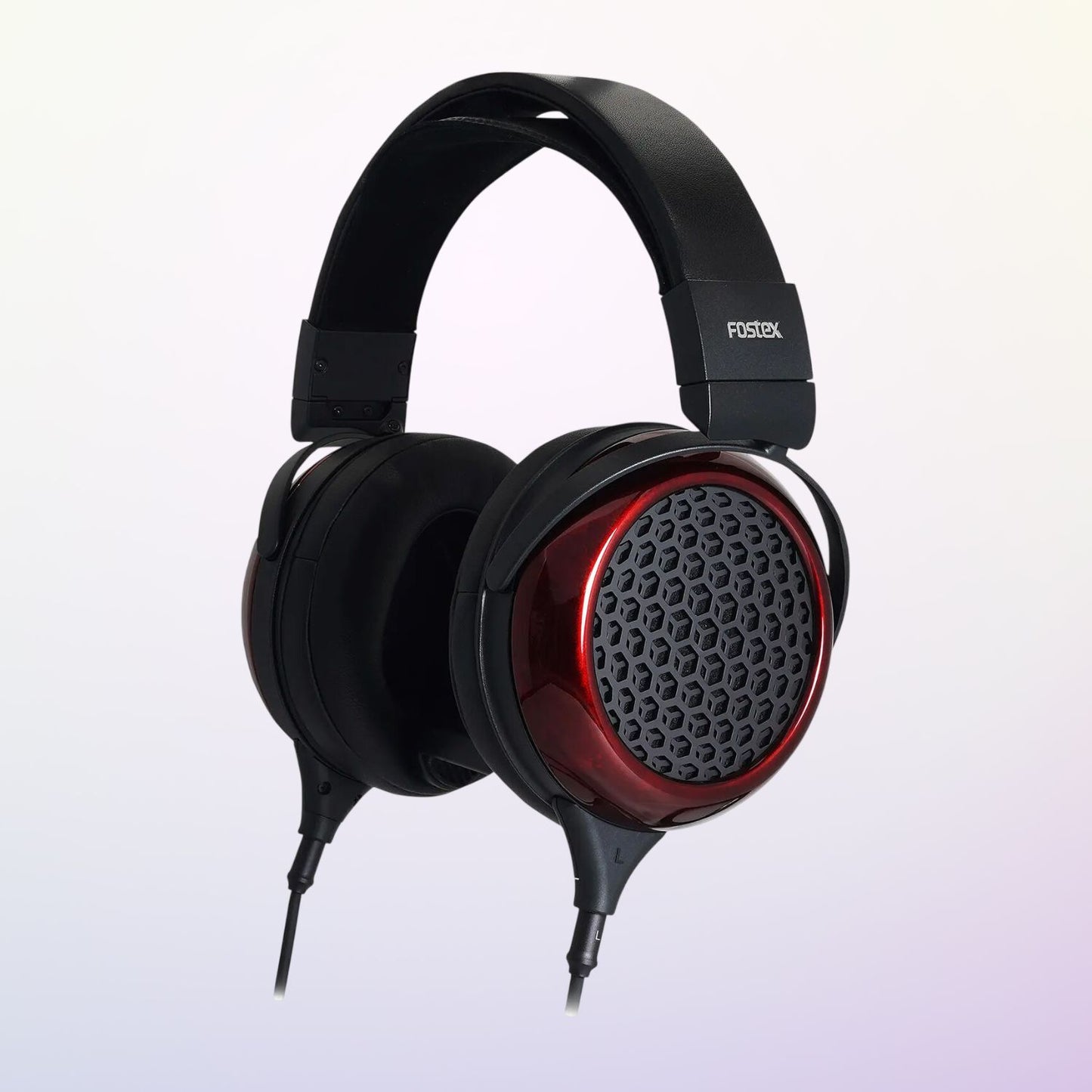 Angled view of Fostex TH919 Premium Headphones on purple background