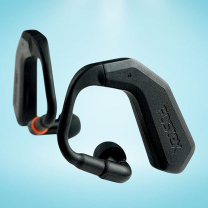 Angled view of Fostex TM2C Wireless Stereo Earphones on blue background