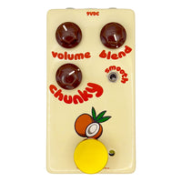 Front view of FruitFX Coconut Compressor Pedal with Gold Footswitch Topper on white background