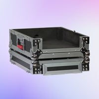 Stack of black and gray DJ equipment cases on a gradient purple background