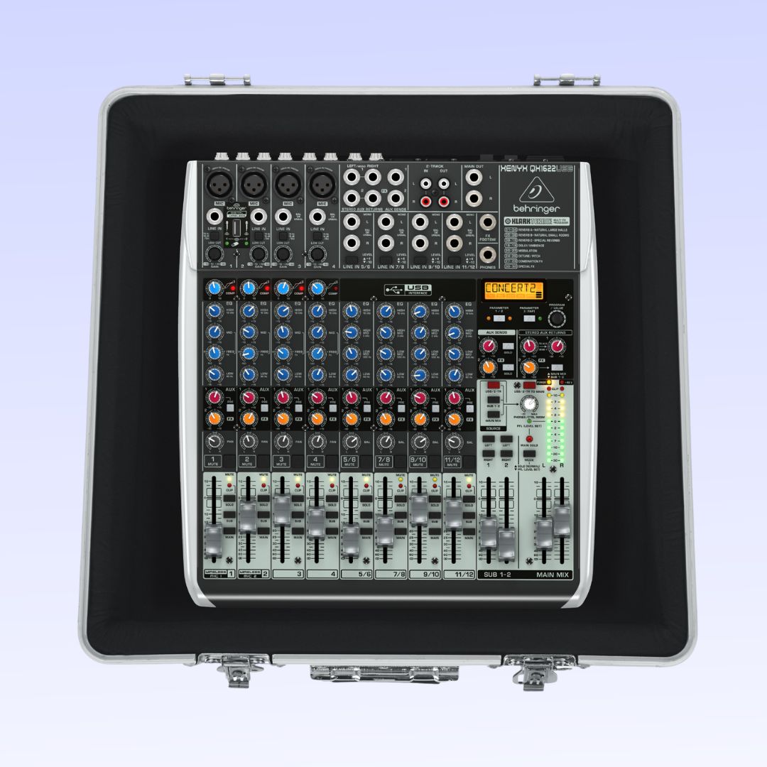 Sound mixing console with Behringer logo in a carrying case on a light blue background