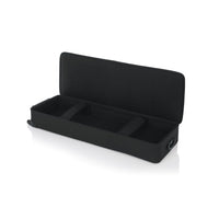 Black rectangular case with a cover on a white background