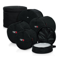Set of black drum bags on a white background