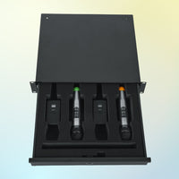 Black tool box with four electronic devices inside on a gradient background
