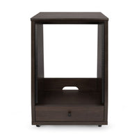 Dark wood side table with a drawer on a white background