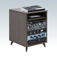 Wooden audio equipment cabinet with electronic devices on a light gray background