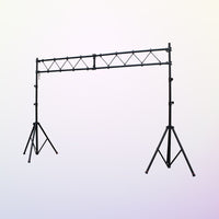 Black truss lighting stand on a light purple background