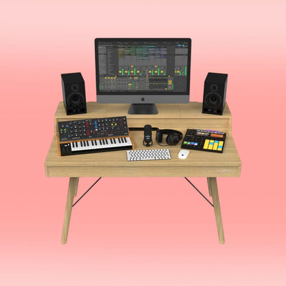 Front view of Glorious Vintage Music Station with gear on it on pink background