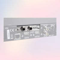 Angled view of Grace Design CR Output Option for m108 on pink and purple background