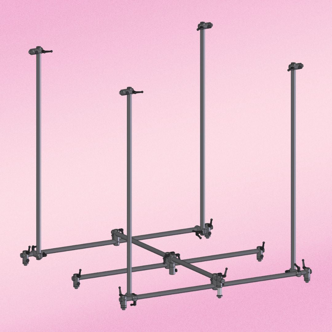 Angled view of Grace Design SB-3D11 11-Channel Immersive Surround Microphone Array on pink background