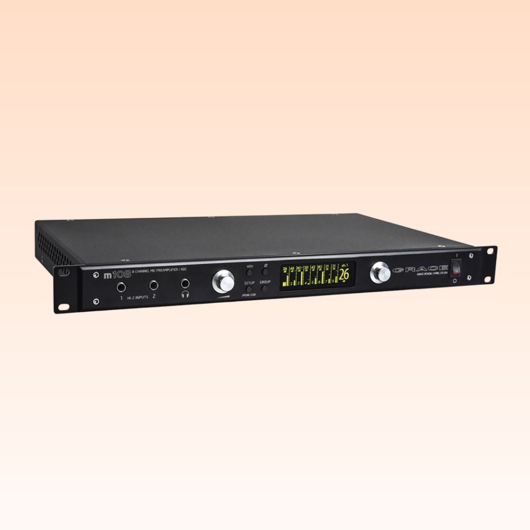 Angled front view of Grace Design m108 8-Channel Remote-Controlled Microphone Preamp on orange background