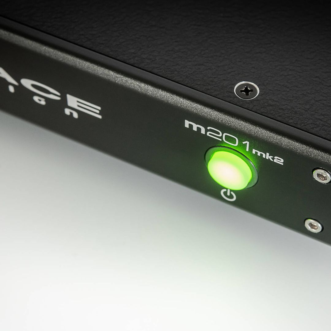 Close up view of Grace Design m201mk2 2-Channel Microphone Preamp on grey surface