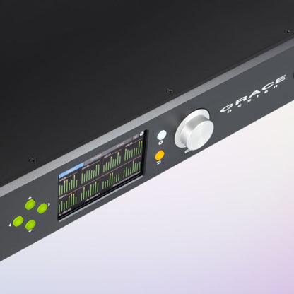 Angled close up view of Grace Design m701 Audio Interface on purple background