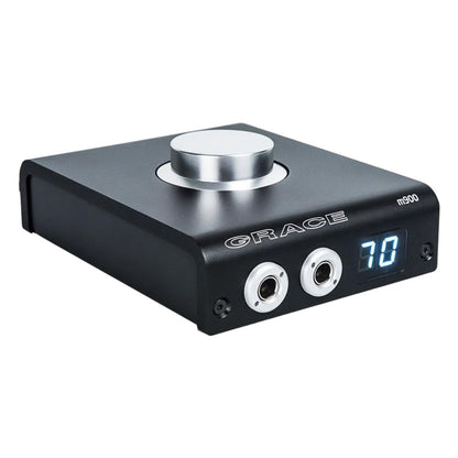 Angled front view of Grace Design m900 DAC Headphone Amplifier on white background