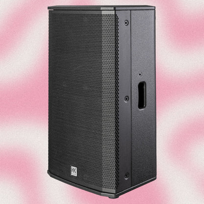 Angled view of HK Audio LUNAR 112 XA Speaker on pink background